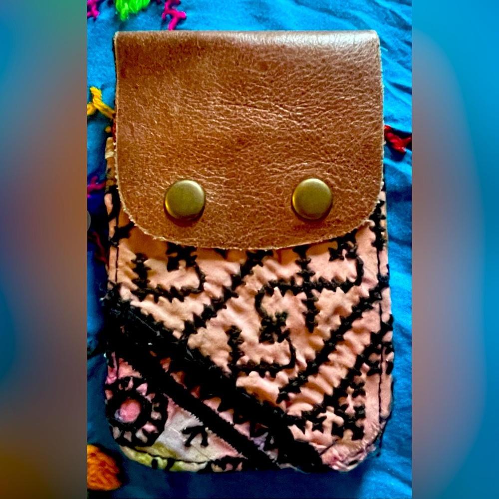 Free people card case. Unique & handmade measures approximately 4 x 5”. New.